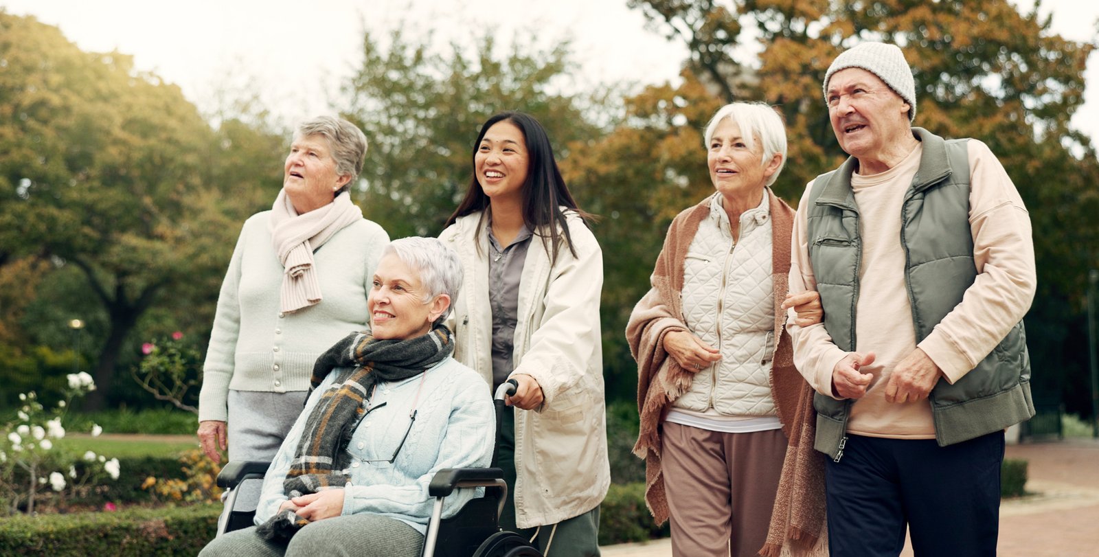 Senior travel group boarding an accessible charter bus in Ontario