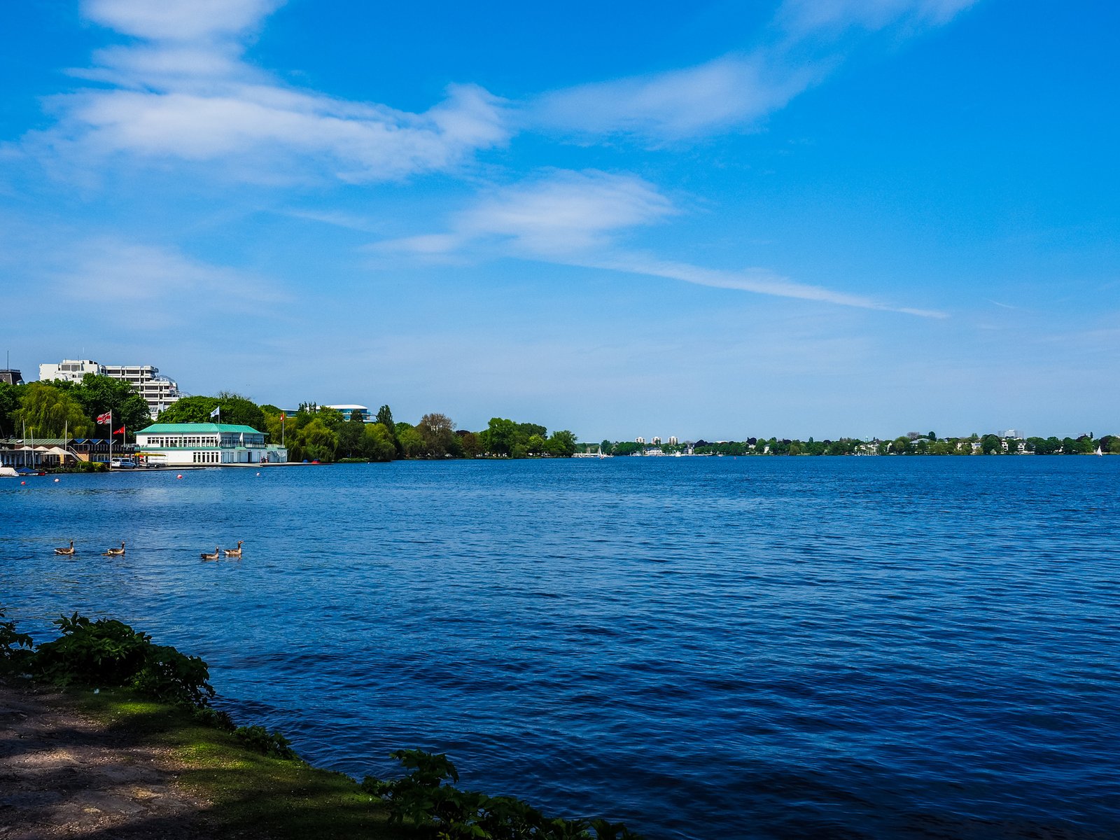 StarTrans coach parked near the waterfront in Kingston, Ontario with the harbour behind